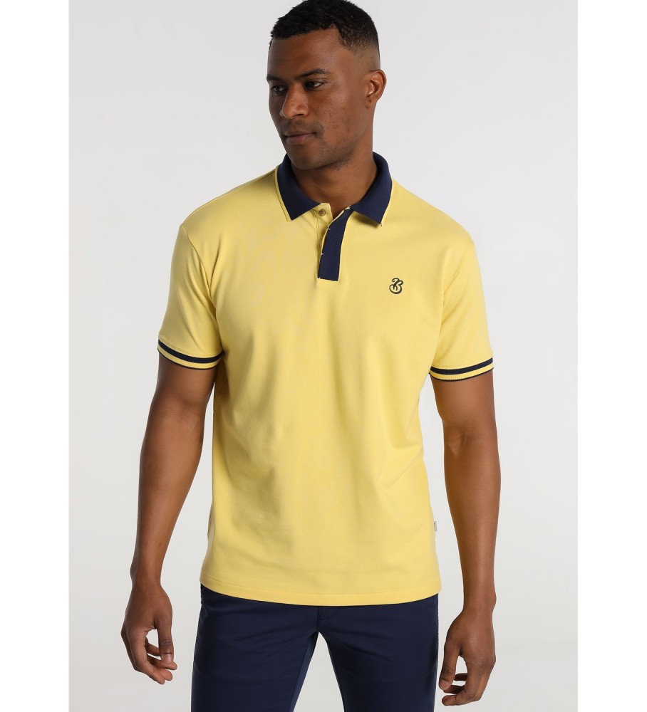Bendorff Camisa pólo básica com logótipo amarelo