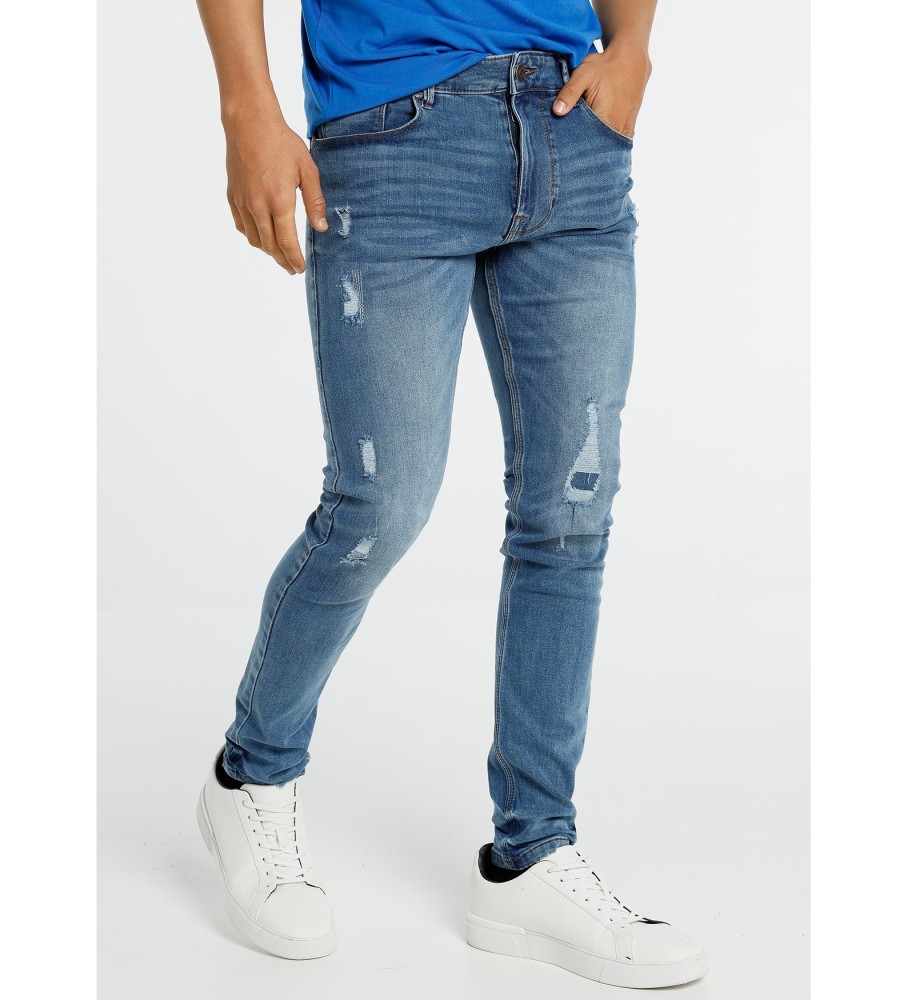 Six Valves Jeans in denim blu medio strappati | magro blu