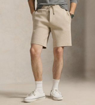 Beige dubbelstickade shorts