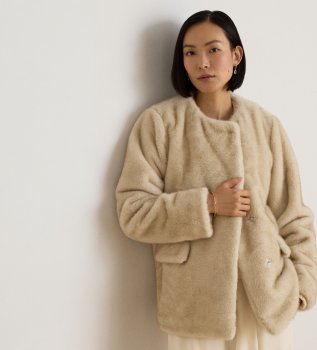 Beige jas van synthetisch bont