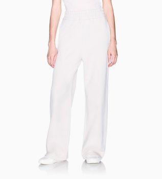 Pantalone largo con vita elastica e logo bianco