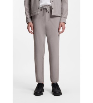 Cal�as de corte c�nico em tecido el�stico com estrutura de malha bege