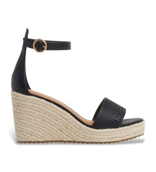 Sandali neri del marchio Wayna