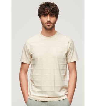 Vintage beige texturerad T-shirt och logotyp