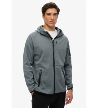 Prosto prilegajoča se majica s kapuco z zadrgo in modrim logotipom Tech