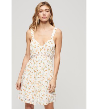 Vit klnning med spetsdetaljer