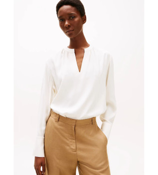 Beige blouse met V-hals en ruches