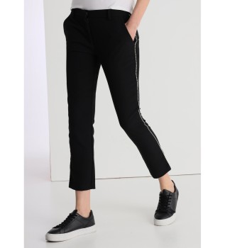 Pantalon avec bande latrale orne de bijoux noirs