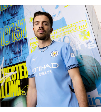 Puma Koszulka MCFC Home Authentic w kolorze niebieskim