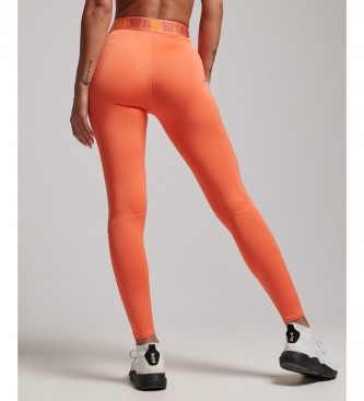 Superdry Leggings attillati elasticizzati con strascico arancione