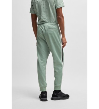 BOSS Jogginghose in lockerer Passform mit gewebten grnen Jacquard-Kreisen