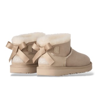 UGG Ultra Mini Bailey Bow Leather Ankle Boots beige