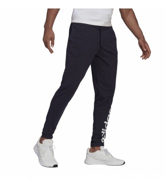 adidas Pantaloni blu navy lineari con polsini elastici affusolati Essentials