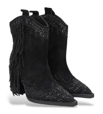 Alma en pena Leather ankle boots with black fringes on the sides