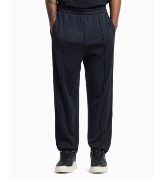 Armani Exchange Joggingbyxor i marinbl frg