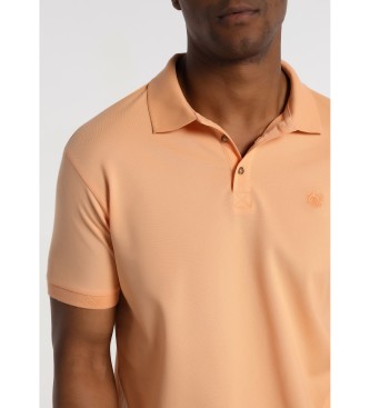 Bendorff Piqu-Poloshirt mit orangefarbenem Logo