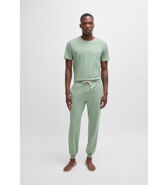 BOSS Tracksuit bottoms in stretch cotton with cuffs and green embroidered logo