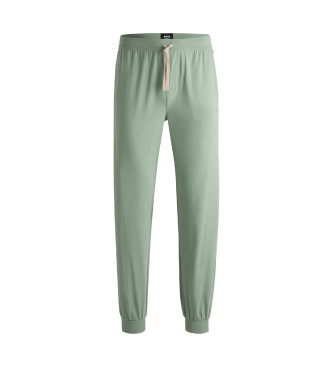 BOSS Tracksuit bottoms in stretch cotton with cuffs and green embroidered logo