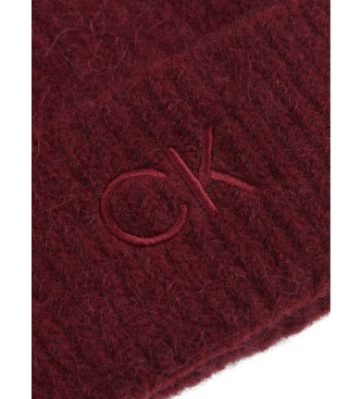 Calvin Klein Mjuk stickad mssa med pompommaroon