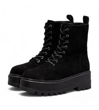 Calvin Klein Jeans Bottines en cuir noir de style militaire 