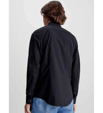 Calvin Klein Jeans Tanka raztegljiva srajca mornarske barve