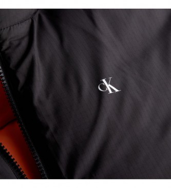 Calvin Klein Jeans Piumino reversibile nero anni '90. Arancia