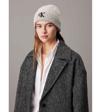 Calvin Klein Jeans Beige knitted hat with pompom