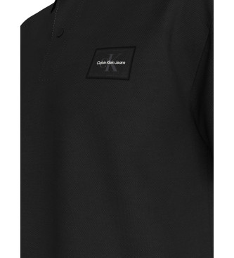 Calvin Klein Jeans Polo con etiqueta tejida negro