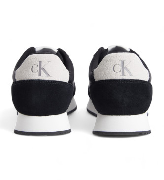 Calvin Klein Jeans Sapatilhas em pele preta com logtipo lateral