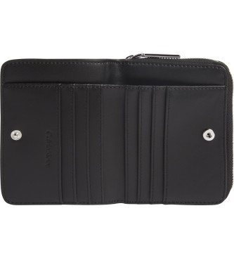 Calvin Klein Wallet with zip around the edge and black logo