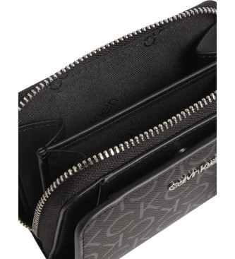 Calvin Klein Wallet with zip around the edge and black logo