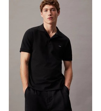 Calvin Klein Polo nera slim in piqu termotecnico