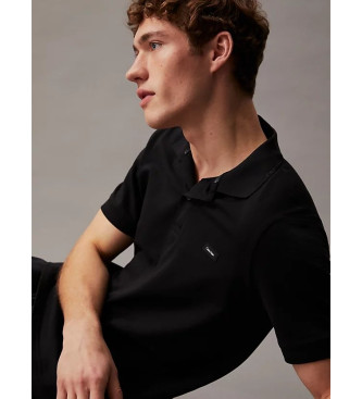 Calvin Klein Polo nera slim in piqu termotecnico
