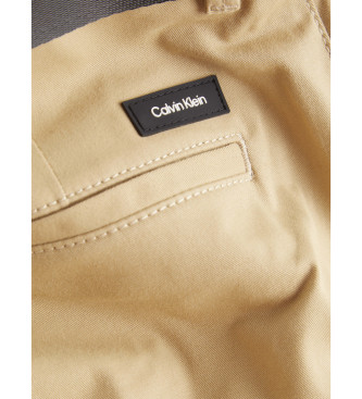 Calvin Klein Cales de corte justo com cintura em sarja bege