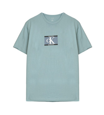 Calvin Klein Majica 30-ih let Box Grafika zelenkasto modra 