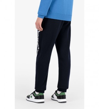 Champion Pantaloni jogger blu navy con logo con scritta sul polsino a costine