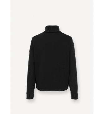 Colmar Jakke med sorte, strikkede rmer