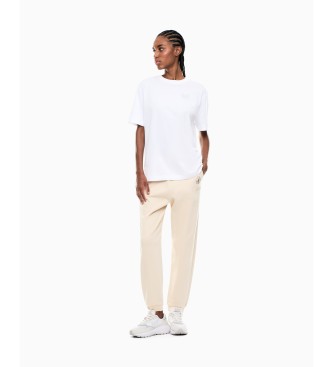 EA7 Pantaloni tuta Graphic Series in misto cotone beige