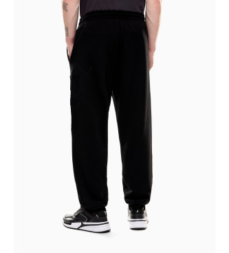 EA7 Tracksuit bottoms Logo Series organic cotton black