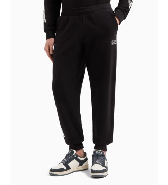 EA7 Tracksuit bottoms Graphic Series in black cotton