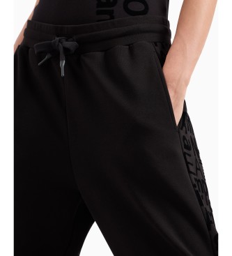 EA7 Pantaloni sportivi della serie Graphic in cotone organico nero e modal elasticizzato