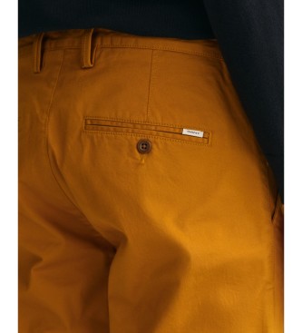 Gant Pomarańczowo-brązowe spodnie Twill Chino Slim Fit