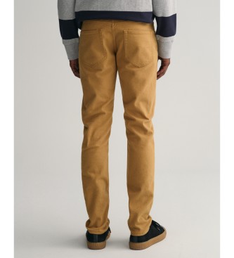 Gant Džins hlače Slim Fit iz mehkega kepra gorčične barve