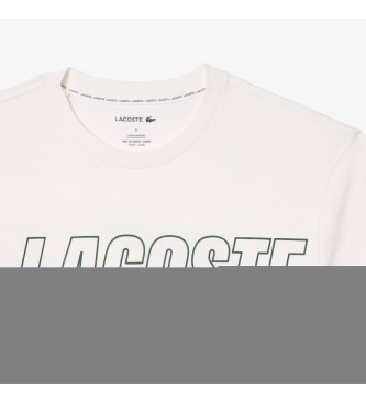Lacoste T-shirt Home com pormenor da marca em nudez contrastante