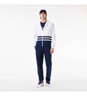 Lacoste Sportsuit tennis tracksuit with white, blue block design