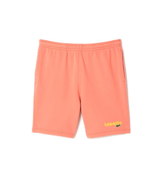 Lacoste Einfarbig orangefarbene Shorts