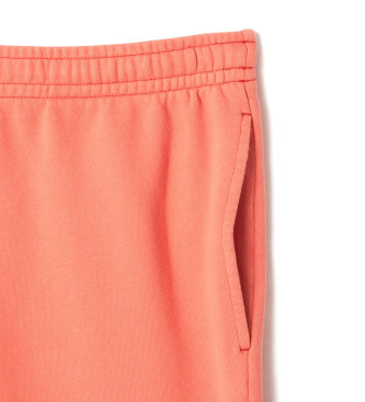 Lacoste Einfarbig orangefarbene Shorts