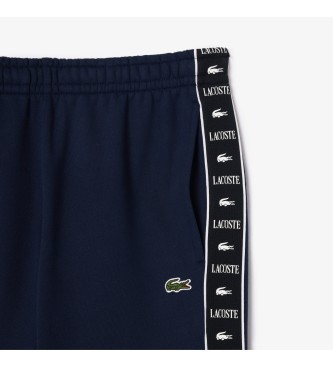 Lacoste Jogger hlače Navy Strip in logotip