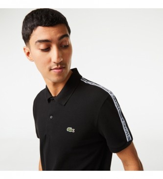 Lacoste Polo dcontract  rayures noires