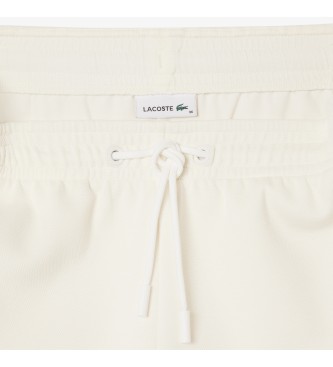 Lacoste Pantaln corto con costuras a contraste blanco roto